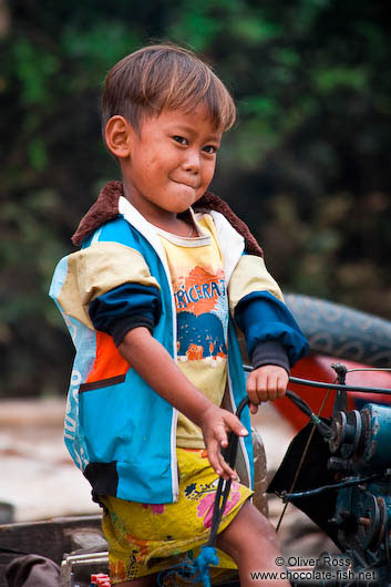 Small boy along the Stung Sangker river near Battambang