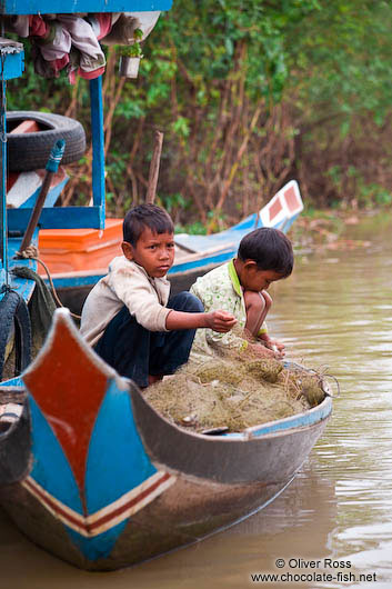 Boys fishing near the Tonle Sap Lake