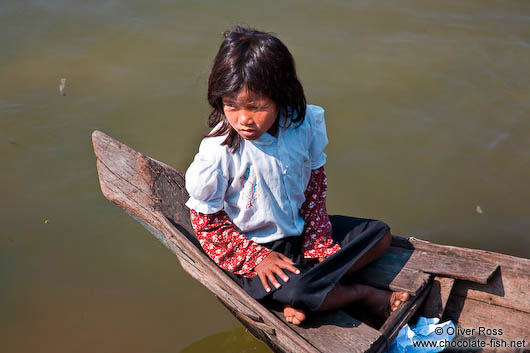 Small girl in boat near Tonle Sap lake