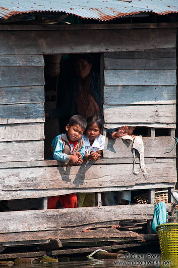 Kids in their floating home near Tonle Sap lake