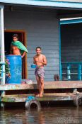 Travel photography:Having a wash near Tonle Sap lake, Cambodia