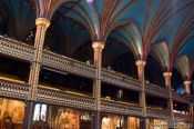 Travel photography:Wooden architecture of the Basilica de Notre Dame cathedral in Montreal, Canada