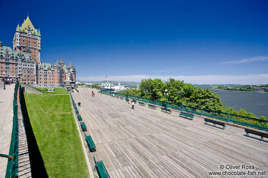 The Château Frontenac castle in Quebec with Terrasse Dufferin promenade and Saint Lawrence river