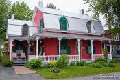 Travel photography:Typical old house along the Saint Lawrence river in Quebec, Canada