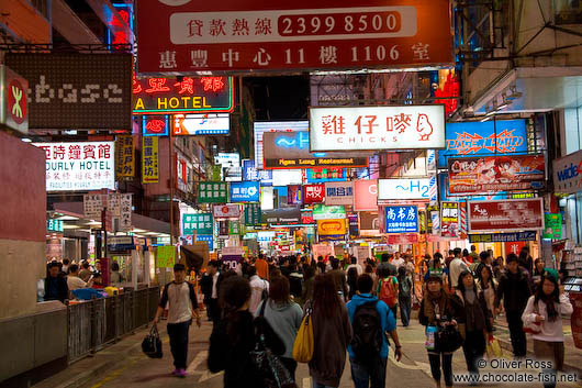Shoppers in Kowloon by night 