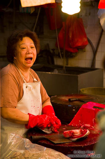 Woman at the Hong Kong fish market 