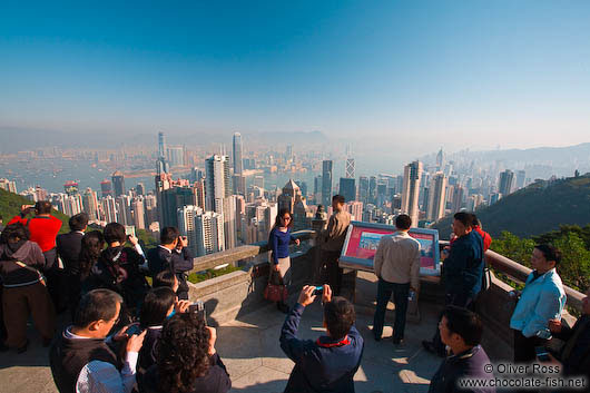 Tourists taking in the view of Hong Kong bay 