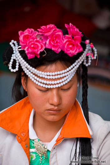 Girl with traditional Naxi dress in Lijiang