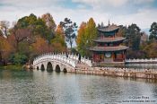 Travel photography:Lijiang Black Dragon Pool with pagoda and bridge , China