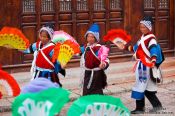 Travel photography:Naxi women performing a traditional dance in Lijiang, China