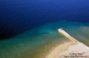 Travel photography:View of the Mediterranean sea from the city walls in Rab, Croatia