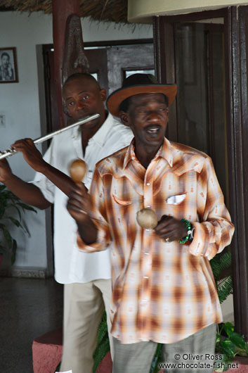 Musicians at a long distance bus stop