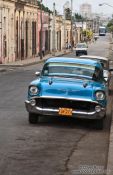 Travel photography:Cienfuegos street with classic car, Cuba