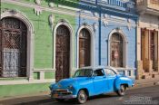 Travel photography:Cienfuegos street with classic car, Cuba