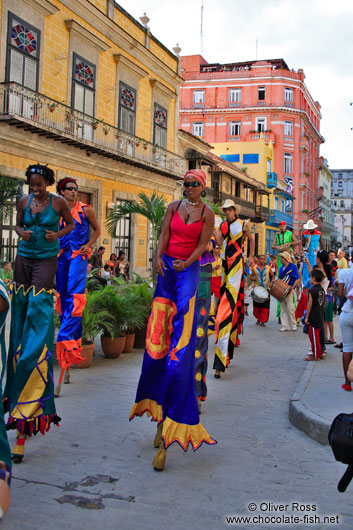 Group of performers on stilts