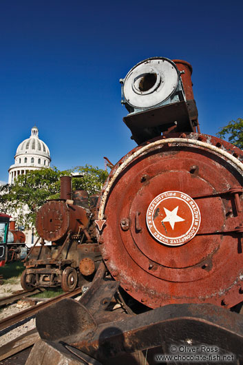Old locomotive with the Capitolio in Havana
