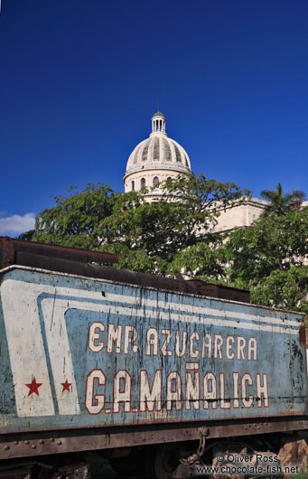 Old train with the Capitolio in Havana