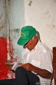 Travel photography:Trinidad man reading, Cuba