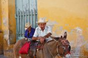 Travel photography:Trinidad man with donkey, Cuba