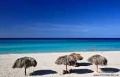 Travel photography:Sun umbrellas on a beach in Varadero, Cuba