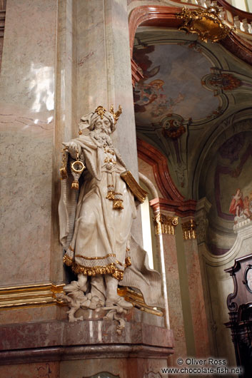 Statue inside Prague`s St. Nicolas church 