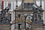 Travel photography:The fighting giants above the main entrance to Prague Castle by artist Ignaz Michael Platzer (1768), Czech Republic