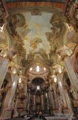 Travel photography:Main ship of Prague`s St. Nicolas church, Czech Republic