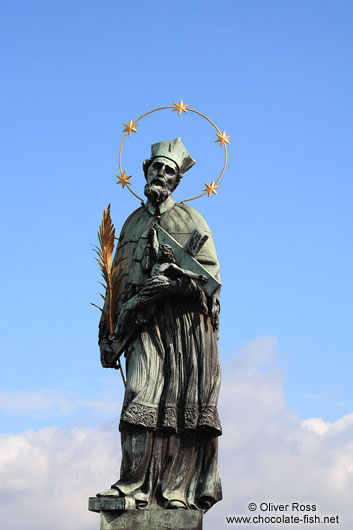 Bronze sculpture of St John of Nepomuk on Charles bridge
