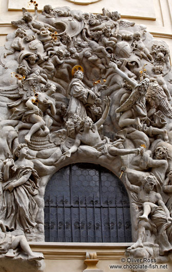 Stucco sculptures above a door of St. James church