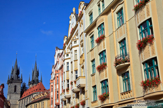 Houses in Prague`s Old Town with Tyn church in the background