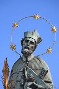 Travel photography:Bronze sculpture of St John of Nepomuk on Charles bridge, Czech Republic