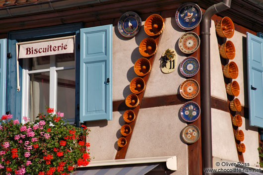 Gugelhupf (ring cake) baking forms on a facade in Obernai