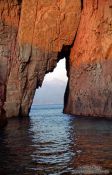Travel photography:Hole in the Rock near Cargese, Corsica, France