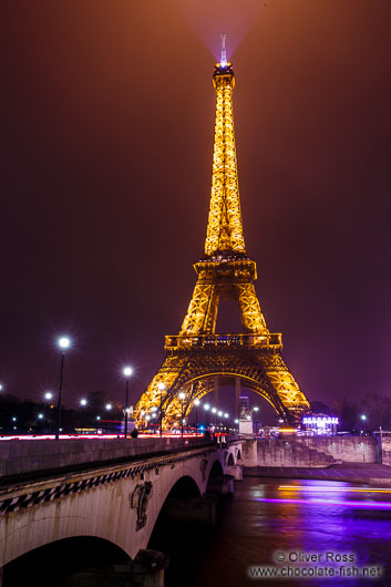 Paris Eiffel Tower at night with river Seine