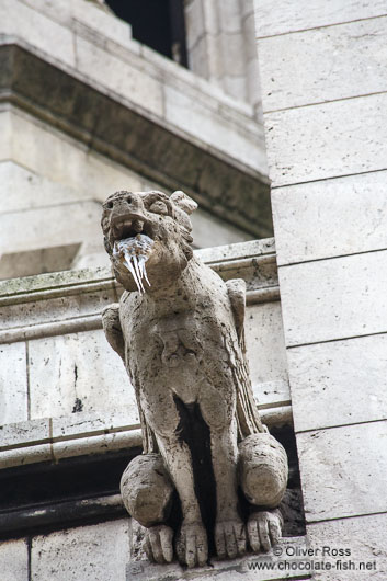 Beard of icicles at a gargoyle on the facade of Sacre Coeur Basilica