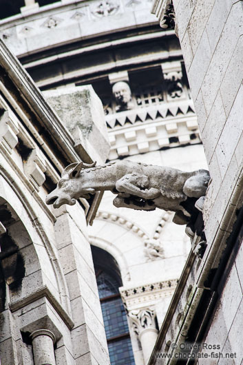 Gargoyle on the facade of Sacre Coeur Basilica in Paris´ Montmartre district