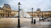 Travel photography:The Louvre museum in Paris with glass pyramid, France