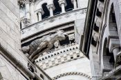 Travel photography:Gargoyle on the facade of Sacre Coeur Basilica in Paris´ Montmartre district, France