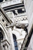 Travel photography:Gargoyle on the facade of Sacre Coeur Basilica in Paris´ Montmartre district, France