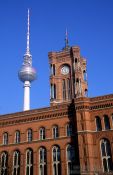 Travel photography:The Rotes Rathaus (Red Cityhall) in Berlin with Fernsehturm (TV tower), Germany
