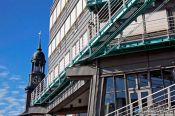 Travel photography:The Gruner & Jahr publishing house with tower of St. Michaelis church (Michel) in Hamburg, Germany