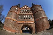Travel photography:Lübeck`s famous Holstentor (city gate) through a fisheye lens, Germany