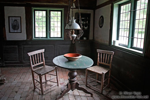 Table with chairs, an 18th century farm house living room