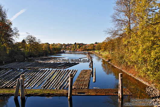 Logs in a side arm of the Kiel canal connecting the North and Baltic Seas near Kiel