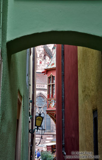 Small alley leading to the cathedral square in Freiburg