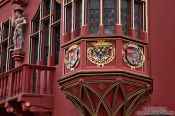Travel photography:Facade detail of the old warehouse on the cathedral square in Freiburg, Germany