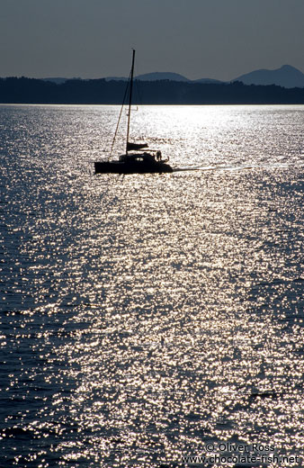 Sailing boat at sunset