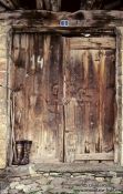 Travel photography:Door with boots in PApigko, Greece