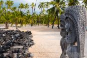 Travel photography:Guardians in Pu`uhonua o Honaunau Ntl. Historical Park, USA