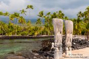 Travel photography:Guardians in Pu`uhonua o Honaunau Ntl. Historical Park, USA